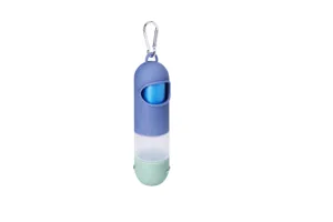 Portable pet waste bag dispenser detail view featuring capsule shape and metal hook.