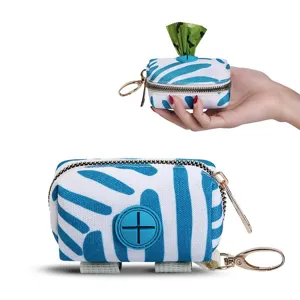 Distributeur portable de sacs à déjections pour chiens, motif bleu, polyester et crochet métal.