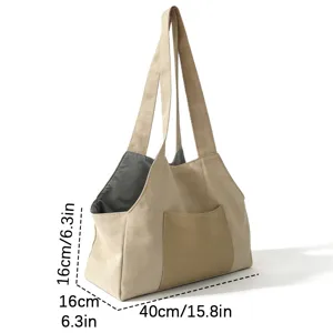 Detailed view of beige canvas pet tote bag with front pocket and clear dimensions display.
