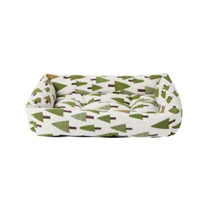 Close-up detail of the breathable pet bed fabric featuring a charming green tree pattern design.
