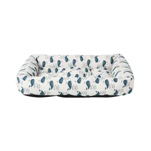 Detailed view of rectangular pet bed with blue whale print, soft fabric for cats and dogs.