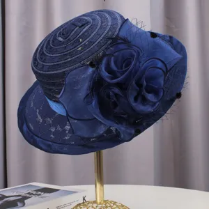 Detailed view of the women vintage blue lace floral flat top hat, elegant summer sun hat accessory.