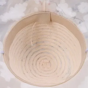 Detailed interior view of women summer floral lace sun hat, showing neat stitching and band.