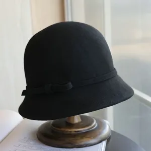 Black wool felt bucket hat with bow, elegant vintage Hepburn style winter hat for women.