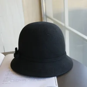 Black wool cloche hat for women, elegant bowknot winter bucket hat, French vintage style accessory.