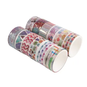 Decorative washi tape detail showing vibrant watercolor patterns and elegant gold foil accents.