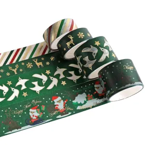 Christmas gold foil washi tape detail showing festive patterns like Santa and reindeer.