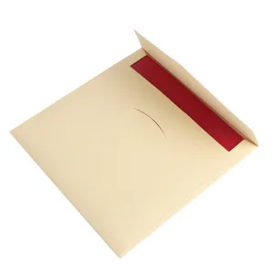 Beige greeting card envelope with red insert and slot design, perfect for holiday gifts.