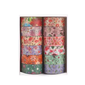 Decorative gold foil washi tape set in a white box, featuring various vintage floral patterns.