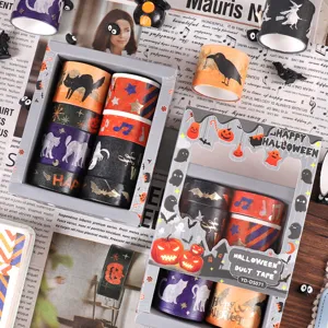 Vue détaillée d'un ensemble de rubans Washi d'Halloween dorés avec motifs festifs pour DIY.