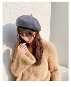 Grey wool beret detail shot, cozy autumn winter fashion women hat, elegant daily accessory.