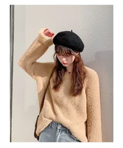 Classic black wool beret detail shot, stylish winter women hat, soft texture and cozy wear.