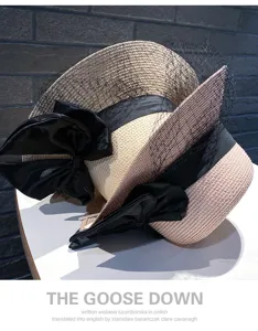 Elegant Audrey style straw sun hat with black mesh ribbon bow for summer women outdoor