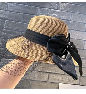 Women summer straw hat with black mesh veil and elegant bow, wide brim sun protection sun hat.