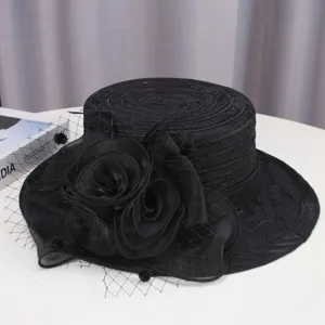 Black vintage flat top hat detail, featuring lace fabric and elegant flower decors with mesh.