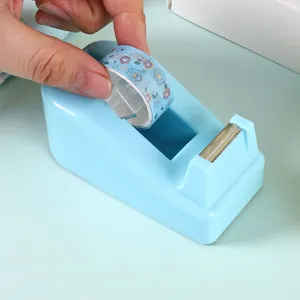 Macaron blue desktop tape dispenser with cute floral washi tape for office and school.