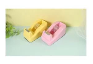 Macaron color mini tape dispenser detail view, compact desktop cutter for office and school.