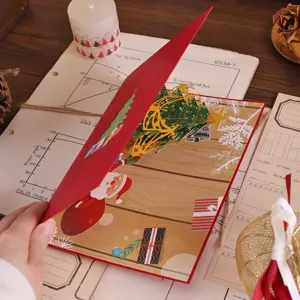 3D pop-up Christmas tree greeting card with intricate paper cutting design for holiday gifts.