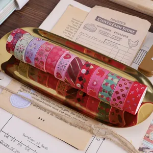 Valentine's Day gold-stamped washi tape set, romantic heart and floral patterns for DIY crafts.