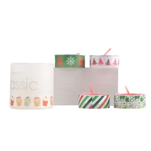 Christmas decorative scented candles set with festive snowflake and tree patterns for holiday.