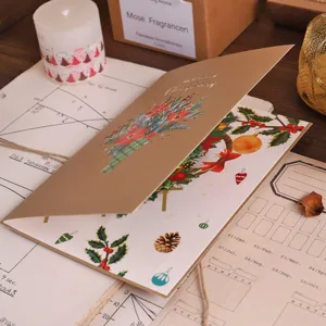 Detailed view of the 3D pop-up Christmas greeting card showcasing intricate paper art.
