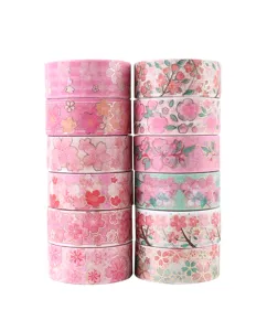 Detailed view of the 12-roll pink cherry blossom gold foil washi tape set for DIY journal decorating.