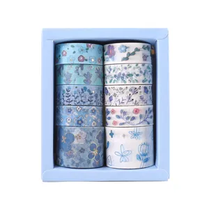 Blue floral washi tape set with ten rolls of decorative adhesive tapes in a gift box for journaling.