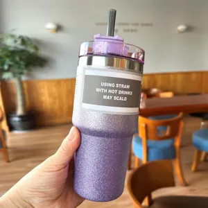 Detail of purple glitter texture on a 30oz stainless steel coffee tumbler with straw