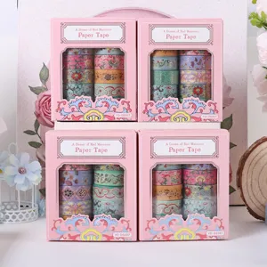 Boxed decorative washi tape set with gold foil floral patterns, perfect for DIY planners.