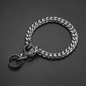 Close-up of 14mm stainless steel cuban link dog chain detail showcasing metal texture.