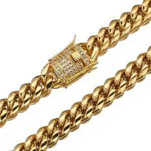 Close-up view of the gold Miami Cuban link chain with micro-paved cubic zirconia clasp details.