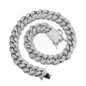 Detailed view of a silver iced out cuban link chain with sparkling pave stones, premium quality.