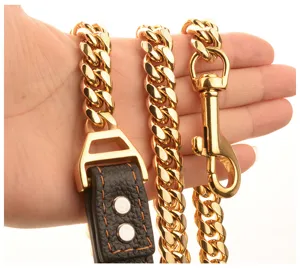 Gold cuban chain pet leash with black leather detail, heavy duty stainless steel dog collar.