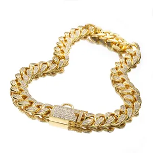 Detailed view of 18mm iced out cuban link pet dog collar in gold brass with sparkling rhinestones.