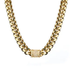 Gold Miami Cuban link chain necklace with iced out micro paved cubic zirconia box clasp.