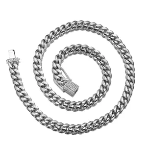 Detailed view of stainless steel Cuban chain necklace with sparkling micro-pave diamond clasp.