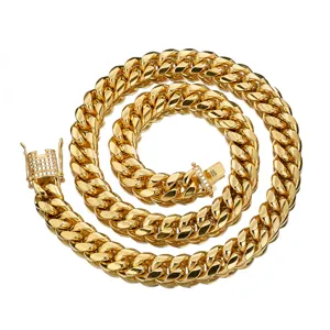 Close-up detail of the gold Cuban link chain with micro-paved diamond clasp, stylish style.
