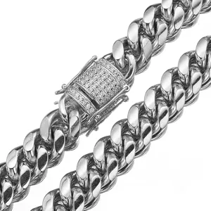 Stainless steel Miami Cuban link chain detail, featuring a secure micro paved crystal clasp.