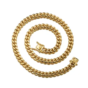 Detailed view of the thick gold Cuban link chain, highlighting its polished surface and secure box clasp.