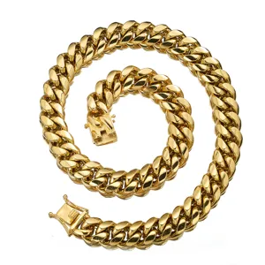 Gold Cuban link chain necklace detail showing polished titanium steel texture and clasp.