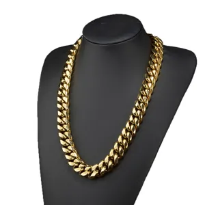 Gold Cuban link chain necklace for men, heavy hip hop stainless steel jewelry detail view.