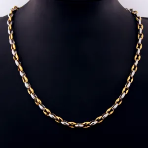 Detailed close-up of the two-tone gold and silver stainless steel coffee bean chain.