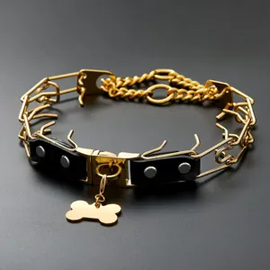 Stainless steel dog training prong collar with leather accent and cute bone pendant for large dogs.