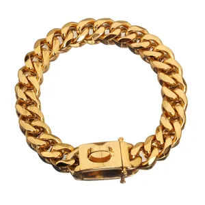 Close up detail of 19mm wide gold metal Cuban link pet chain collar with secure lock.