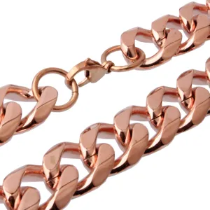 Macro detailed close-up shot of the rose gold plated titanium steel cuban link necklace.