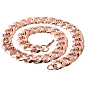 Detailed close-up of a stylish rose gold stainless steel cuban link chain necklace.