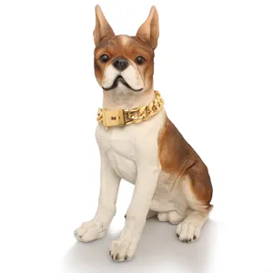 Resin dog figurine wearing a chunky gold chain necklace, ideal for home decor and display.