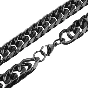 Close up detail of black stainless steel Cuban link chain necklace for men jewelry details.