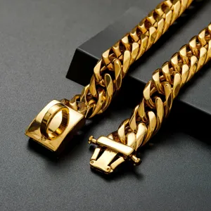 Close-up detail of heavy gold-tone metal cuban link dog collar with secure buckle and ring.