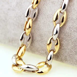 Detailed close-up view of men's two-tone stainless steel coffee bean link chain necklace.